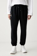 Under Armour spodnie dresowe męskie z bawełną Essential Fleece czarne regular waist 1373882