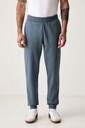 Puma spodnie dresowe męskie z bawełną Essential Logo niebieskie regular waist 682607
