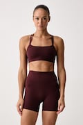 Nike biustonosz do jogi Zenvy Strappy brązowy IB9847.658