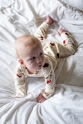 That's mine pajacyk niemowlęcy z bawełną Elliotte onesie beżowy 008648