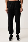 Nike spodnie dresowe damskie Studio Fleece Therma-FIT czarne regular waist IO0437.010