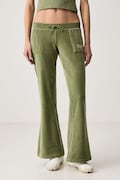 Juicy Couture spodnie flare damskie z bawełną REGAL REBELLE CAISA ULTRA LOW RISE zielone low waist JCGBJ226012