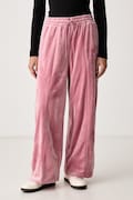 Puma spodnie dresowe damskie welurowe Essentials Elevated różowe high waist 694022