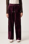 Puma spodnie dresowe damskie welurowe Essentials Elevated bordowe high waist 694022