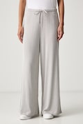 Puma spodnie dresowe damskie z wiskozą Essentials Ribbed beżowe high waist 636667