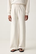 Calvin Klein tepláky dámské bavlněné béžové high waist LV044G248G