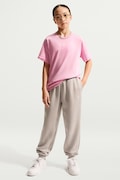 Nike spodnie dresowe dziecięce z bawełną Nike Sportswear Studio Fleece beżowe regular waist IM4905