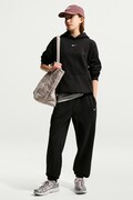 Nike teplákové nohavice detské s bavlnou Nike Sportswear Studio Fleece čierne regular waist IM4905