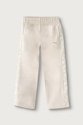 Puma spodnie dresowe dziecięce z bawełną ESS TAPE Relaxed Sweatpants beżowe regular waist 694959