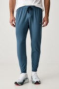 Nike spodnie dresowe męskie Stride Dri-FIT niebieskie high waist HV4544.438