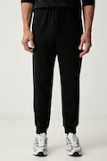 The North Face spodnie dresowe męskie z bawełną Evolution czarne regular waist NF0A8CWYJK31