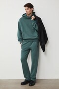 Medicine spodnie dresowe męskie bawełniane zielone regular waist