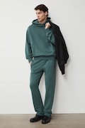 Medicine spodnie dresowe męskie bawełniane zielone regular waist
