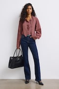 Jeansy flare damskie z efektem sprania granatowe RW26-SJD501