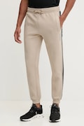 Guess pantaloni de trening culoarea bej, cu imprimeu