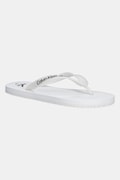 Calvin Klein Jeans japonki BEACH SANDAL TRANSPARENT TPU damskie kolor biały na płaskim obcasie YW0YW01829