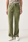 Juicy Couture nohavice flare dámske zamatové TINA TRACK PANT zelené low waist JCAPW045