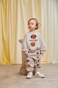 Mini Rodini bluza bawełniana dziecięca Doggies kolor beżowy z nadrukiem 26120125