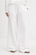 Tommy Jeans teplákové nohavice dámske bavlnené béžové regular waist DW0DW22735