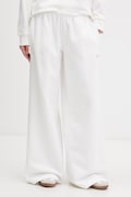 Tommy Jeans teplákové nohavice dámske bavlnené béžové regular waist DW0DW22735