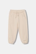 United Colors of Benetton teplákové nohavice detské bavlnené béžové high waist 3NBMGF05D