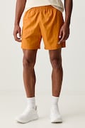 The North Face szorty sportowe męskie 24/7 pomarańczowe regular waist NF0A8G89G5I1