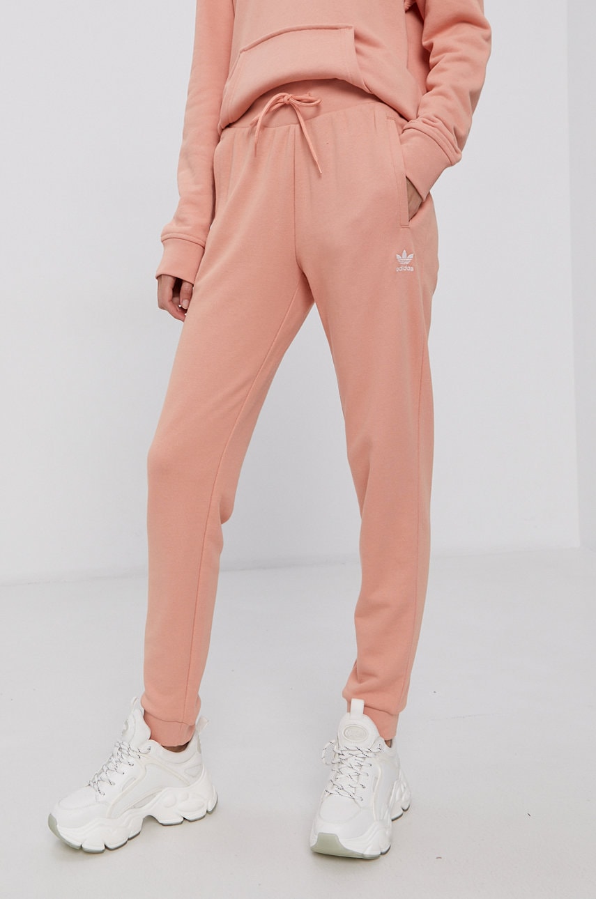adidas Originals trousers women s orange color at PRM US