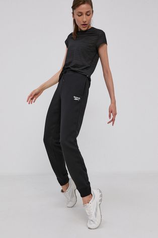 Панталон Reebok дамски в черно с изчистен дизайн