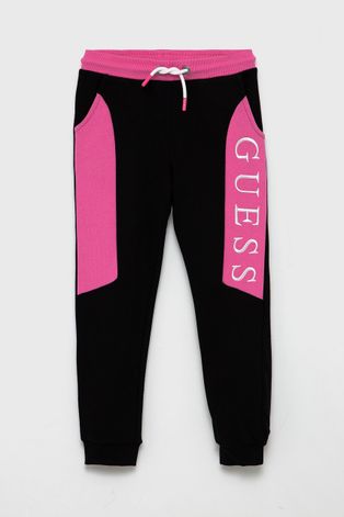 Guess Spodnie dziecięce kolor różowy z aplikacją