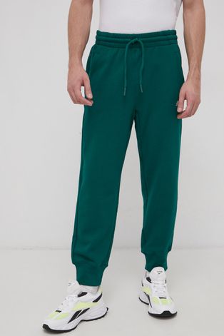 Бавовняні штани adidas Performance чоловічі колір зелений гладке