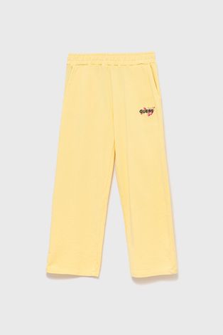 Дитячі спортивні штани Guess колір жовтий однотонні