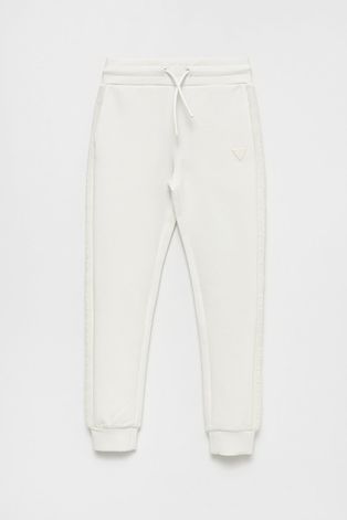Дитячі спортивні штани Guess колір білий однотонні