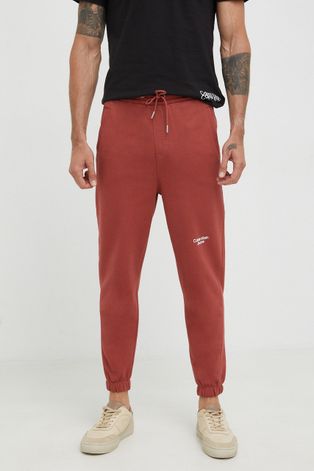 Calvin Klein Jeans spodnie dresowe bawełniane męskie kolor czerwony z nadrukiem