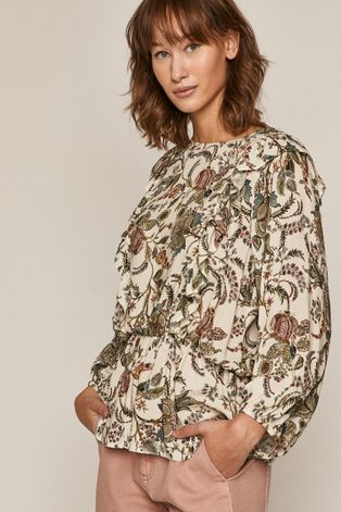 Wzorzysta bluzka damska z ozdobnymi falbanami kremowa