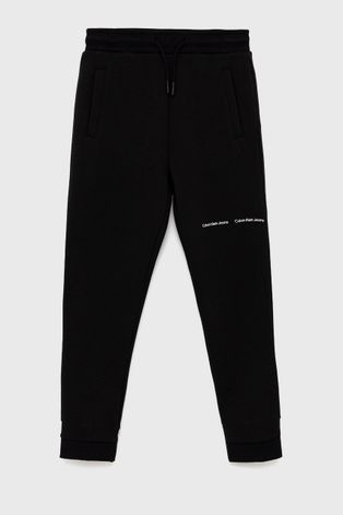 Детские брюки Calvin Klein Jeans цвет чёрный с принтом