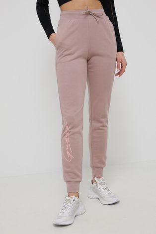 Guess Spodnie bawełniane damskie kolor różowy z nadrukiem