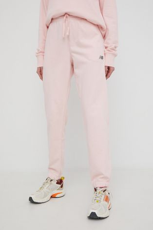 New Balance spodnie dresowe UP21500PIE damskie kolor różowy gładkie