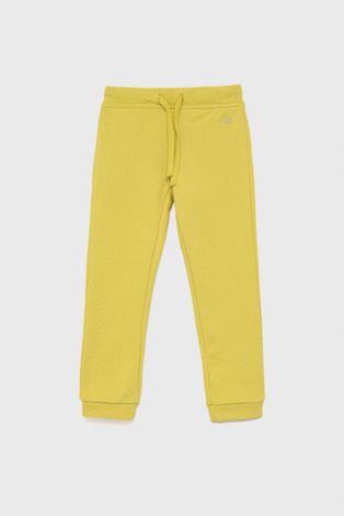Дитячі бавовняні штани United Colors of Benetton колір жовтий гладке