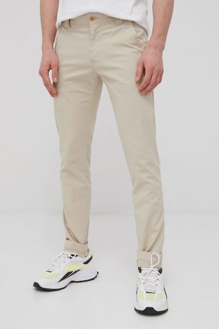 Nohavice Tommy Jeans pánske, žltá farba, strih chinos