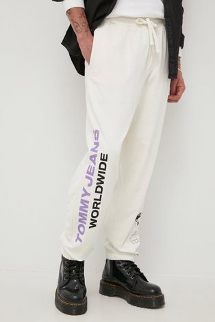 Tommy Jeans Spodnie bawełniane męskie kolor beżowy z nadrukiem