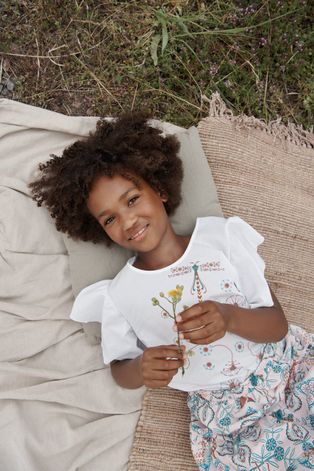 Детская хлопковая блузка Reima цвет белый с принтом