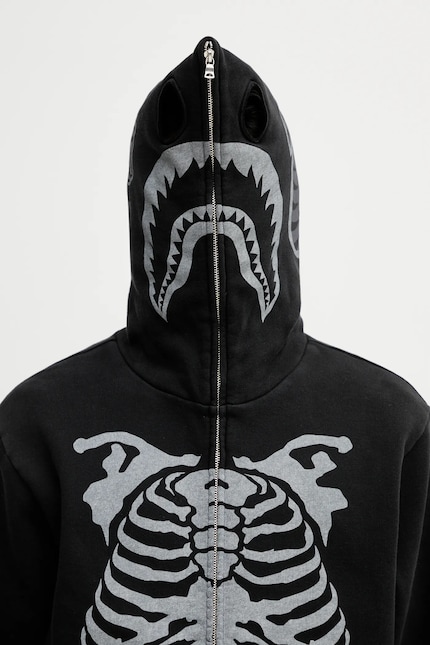 A Bathing Ape sweatshirt Skeleton Shark black color hooded with a A Bathing Ape sweatshirt Skeleton Shark black color hooded with a