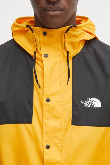 The North Face jacket Seasonal Mountain yellow color NF0A5IG34WP1