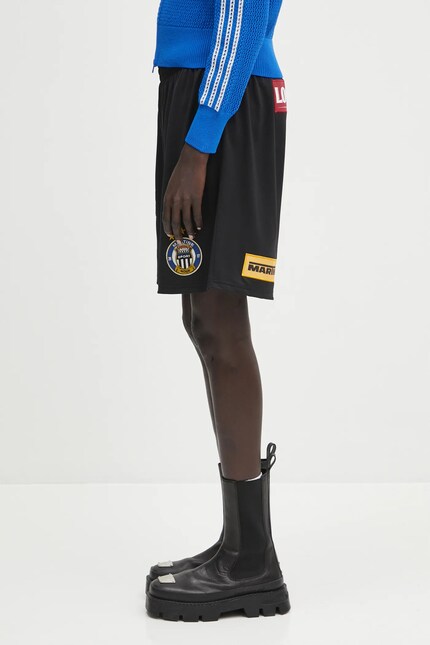 Martine Rose shorts Football black color with an application