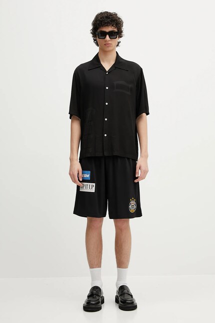 Martine Rose shorts Football black color with an application