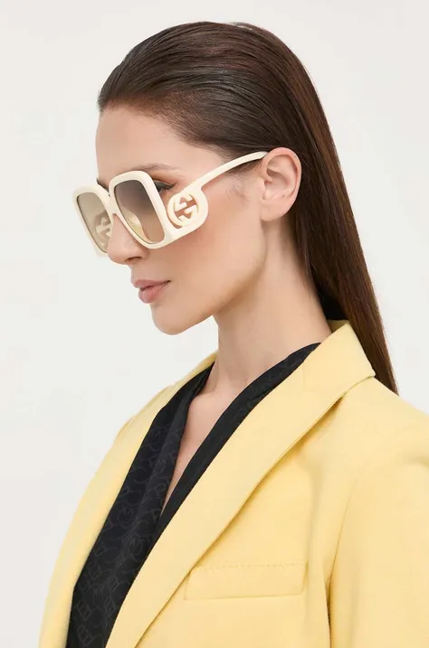 Сонцезахисні окуляри Gucci жіночі колір бежевий