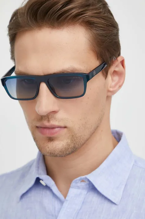 Сонцезахисні окуляри Guess чоловічі колір синій