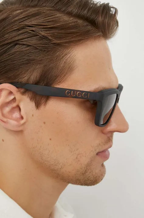 Сонцезахисні окуляри Gucci чоловічі колір коричневий