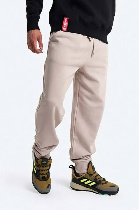 Хлопковые спортивные штаны Alpha Industries цвет бежевый однотонные 118365.627-beige