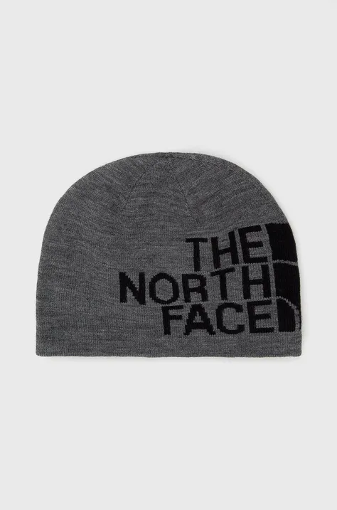 Obojstranná čiapka The North Face šedá farba, z tenkej pleteniny